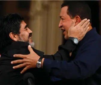  ??  ?? Diego Maradona and Venezuela’s former president Hugo Chavez embrace after Maradona arrived at the Miraflores presidenti­al palace in Caracas in July 2010