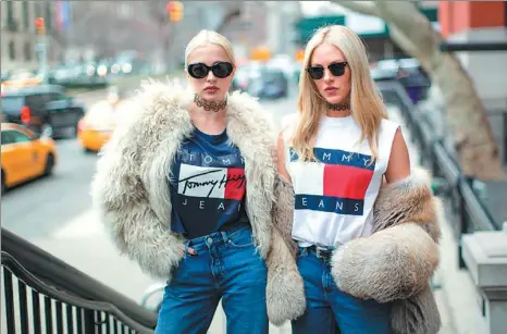  ?? TOMMY HILFIGER LICENSING LLC / TOMMY HILFIGER LICENSING BV ?? Caroline Vreeland and Shea Marie wear Tommy Hilfiger for autumn 2016.