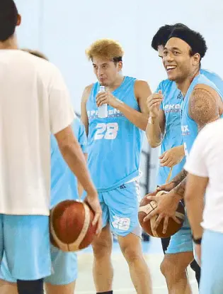  ?? PBA IMAGE ?? Calvin Abueva, right, and his teammates are cheerful in practice yesterday, celebratin­g the reinstatem­ent from indefinite suspension of The Beast.