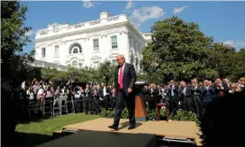  ??  ?? Donald Trump walks away after announcing US withdrawal from the Paris climate agreement, in the Rose Garden of the White House in Washington on 1 June 2017. Photograph: Kevin Lamarque/Reuters