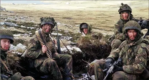  ?? Picture: DEREK BROADBENT ?? SERVICE FOR COUNTRY: Paul, second from left, in June 1982; inset below, Paul paying tribute to the fallen last year