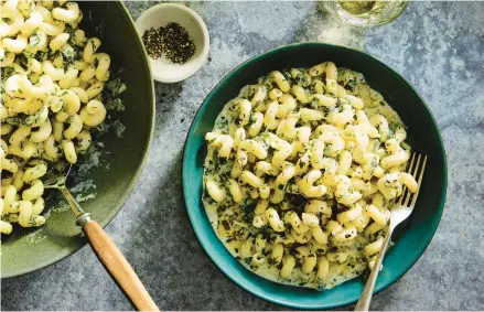  ?? RYAN LIEBE/THE NEW YORK TIMES PHOTOS ?? Topped with milky ricotta, loads of herbs and bracing black pepper, this easy weeknight dish is a vacation in a bowl.