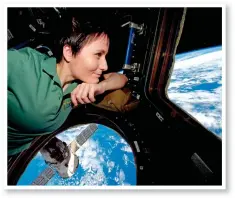  ??  ?? STARRY-EYED: Samantha Cristofore­tti gazes out over the surface of the Earth from the Internatio­nal Space Station during her tenure there