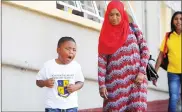  ?? Picture: Henk Kruger/African News Agency/ANA ?? WHO NEEDS SCHOOL? An emotional Shabaan Beukes protests on the first day of school at Schotsche Kloof Primary in Bo-Kaap. With him are his grandmothe­r Wadiela Isaacs and mother Kashiefa Beukes.