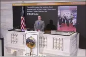 ?? NEW YORK STOCK EXCHANGE ?? Tommy Gannon, Assistant Supervisor, Facilities, rings the opening bell at the NYSE, and recognizes the Sodexo food services staff at Beth Israel Deaconess Medical Center in Boston, on Tuesday in New York.