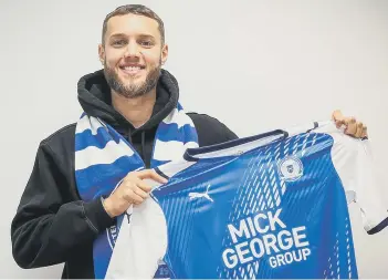  ??  ?? Jorge Grant after signing for Posh. Photo: Joe Dent/theposh.com