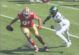  ?? BILL KOSTROUN — THE ASSOCIATED PRESS ?? The San Francisco 49ers’ Jordan Reed (81) breaks away from the New York Jets’ Marcus Maye (20) for a touchdown during the first half Sunday in East Rutherford, N.J.