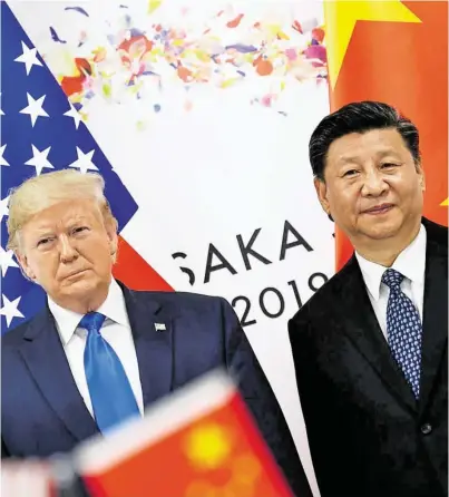  ?? BILD: SN/APA/AFP/BRENDAN SMIALOWSKI ?? Wer regiert die Welt? US-Präsident Donald Trump & Chinas Führer Xi Jinping.