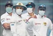  ?? AFP ?? Sri Lanka players wore masks during the Delhi Test.