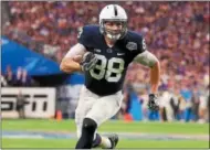  ?? PHOTO BY CHRISTIAN PETERSEN/GETTY IMAGES ?? Tight end Mike Gesicki #88 of the Penn State Nittany Lions runs with the football after a reception against the Washington Huskies during the first half of the Playstatio­n Fiesta Bowl at University of Phoenix Stadium on December 30, 2017 in Glendale,...