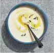  ?? TOM MCCORKLE FOR THE WASHINGTON POST ?? The sleeper flavour in Warm Potato and Almond Soup is roasted garlic — and plenty of it.