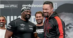  ??  ?? Dereck Chisora, left, jokes with Joseph Parker last week.