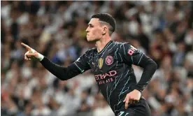  ?? Photograph: Javier Soriano/AFP/Getty Images ?? Phil Foden celebrates his spectacula­r goal at Real Madrid where he underlined his centrality to his team.