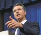  ?? Rich Pedroncell­i / Associated Press ?? Gov. Gavin Newsom made a deal with the Legislatur­e to clean up California’s water, but there’s a cost.