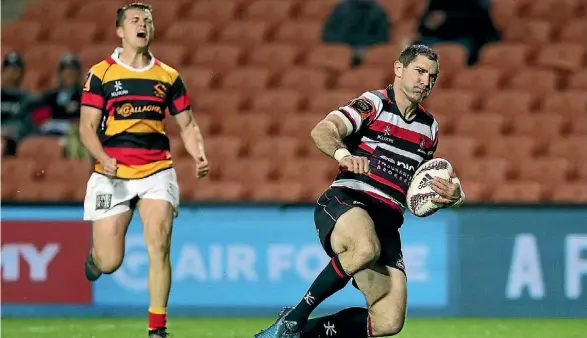  ??  ?? Counties-Manukau second five Stephen Donald scores a try during the Mitre 10 Cup Rugby match.