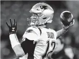  ?? Gail Burton / Associated Press ?? Quarterbac­ks Lamar Jackson (top) of Baltimore, Jacoby Brissett (above, left) of Indianapol­is and Tom Brady of New England will be a good challenge for the Texans’ defense.