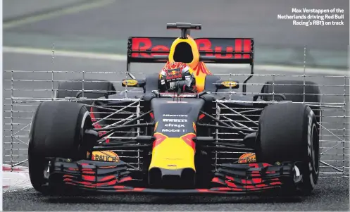  ??  ?? Max Verstappen of the Netherland­s driving Red Bull
Racing’s RB13 on track