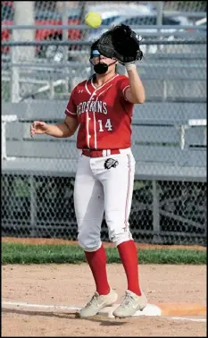  ?? Photos by John Zwez ?? Left, Alyna Spangler of Wapakoneta crosses home plate in Wednesday’s sectional title game. Right, Aryka Watt gets
the force out at first base in the Redskins 13-0 sectional title win over Toledo Start.