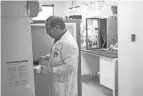  ?? ?? Sarepta Therapeuti­cs research associate Joe Piper works in a new lab inside the 85,000 square foot research facility near Easton.