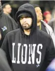  ?? PAUL SANCYA AP ?? Eminem, seen before last week’s wild-card playoff game, helped push Lions fans into a frenzy.