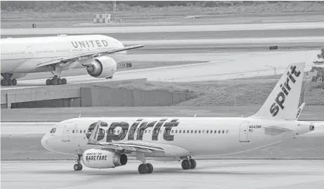  ?? Bill Montgomery / Houston Chronicle ?? A Spirit Airlines Airbus A320 taxis at Bush Interconti­nental Airport. Spirit has received the highest rate of customer complaints.