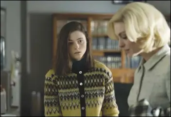  ?? ASSOCIATED PRESS ?? This image released by Neon shows Thomasin McKenzie (left) and Anne Hathaway in a scene from “Eileen.”