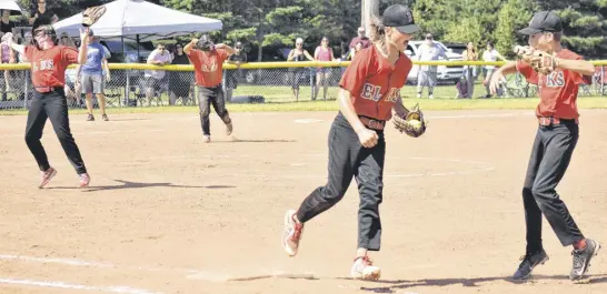  ?? FILE ?? Members of the Brookfield Elks U-15 softball team begin to celebrate their Atlantic championsh­ip last summer at Elk Park.