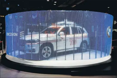  ?? Picture: AFP ?? FUTURE TREND: A 5G connected car produced by Ericsson, SK telecom and BMW companies is unveiled at the Mobile World Congress in Barcelona, on Monday. Though there is growing excitement over connected cars, concerns over hacking and legal issues persist