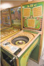  ?? ?? United’s A-B-C bingo pinball machine from 1951 that features a roulette wheel in the playing field is part of the Glaudas’ collection. Glauda and his son Mike Glauda have plans to open a museum in Pottsville with the machines.