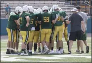  ?? JENNIFER FORBUS — FOR THE MORNING JOURNAL ?? The Amherst offense huddles up during their scrimmage against the Valley Forge Patriots on Aug. 16.