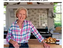  ??  ?? On the move: Mary Berry in her old kitchen