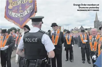  ?? PACEMAKER/GETTY IMAGES ?? Orange Order members at
Drumcree yesterday