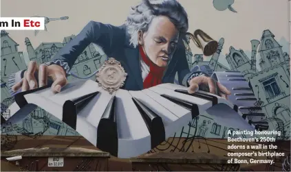  ??  ?? A painting honouring Beethoven’s 250th adorns a wall in the composer’s birthplace of Bonn, Germany.