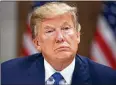  ?? EVAN VUCCI / AP ?? President Donald Trump raised the possibilit­y Tuesday of closing the government if he can’t get his way on immigratio­n.