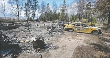  ?? ANDREW VAUGHAN / THE CANADIAN PRESS ?? A fire-destroyed property registered to Gabriel Wortman in Portapique, N.S. Newly released documents suggest the gunman planned to “get” a pair of people in Halifax during his rampage, but Mounties were warned by his spouse.