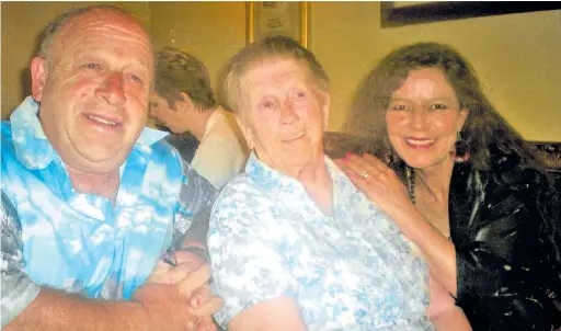  ?? Pictures: SWNS ?? Peter Sawyckyj with wife Andreia and, centre, his mother Doris who he described as ‘mentally aware’ just one day before she died