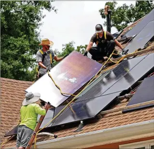  ?? JASON GETZ/JASON.GETZ@AJC.COM/2022 ?? One of the challenges being addressed by the booming solar energy industry is how to deal with used solar panels. Solarcycle plans to build a factory in Cedartown that will take damaged or decommissi­oned panels and recycle them, making specialize­d glass for photovolta­ics.