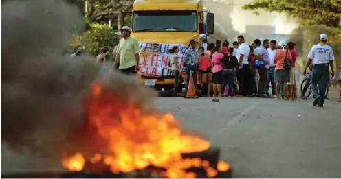  ?? Foto: AFP ?? Flammende Proteste in Rivas gegen den Baubeginn des Nicaragua-Kanals im Dezember 2014