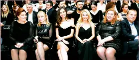  ??  ?? Turkish celebritie­s were also among the audience such as Miss Turkey 2014 Amine Gül (third from left) and presenter Ece Erken (fourth from left)