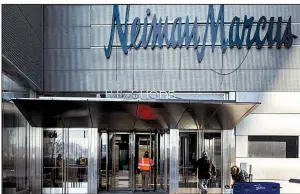  ?? Bloomberg News/DEMETRIUS FREEMAN ?? A contractor enters a Neiman Marcus Group Ltd. store at the Hudson Yards developmen­t in New York earlier this month.