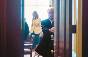 ?? J. SCOTT APPLEWHITE/AP ?? Steve Ricchetti, counselor to President Joe Biden, shuts the door Friday for a meeting with House Speaker Kevin McCarthy’s representa­tives during negotiatio­ns over the debt limit crisis at the Capitol in Washington.