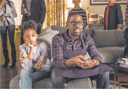  ?? Ron Batzdorff / NBC ?? Sterling K. Brown, shown with Eris Baker, plays Randall in “This Is Us,” a family drama on NBC.