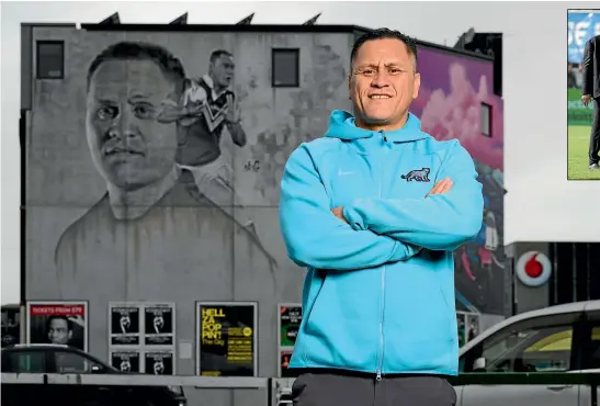  ?? KAI SCHWOERER/STUFF ?? Argentina defence coach David Kidwell poses in front of a mural of himself, painted by artist Graham Hoete in 2017. Kidwell regards Christchur­ch as his home town.