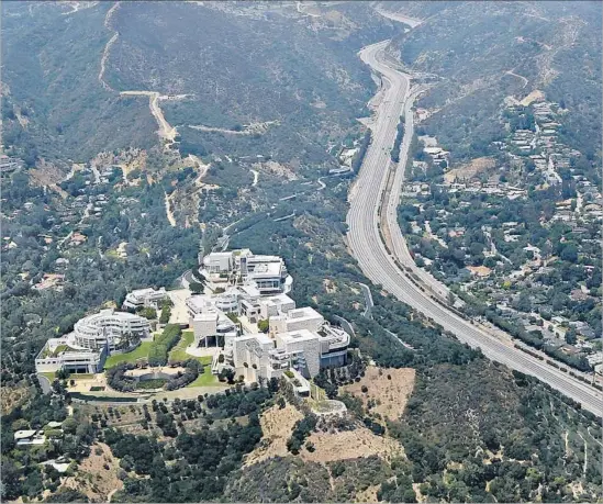  ?? Robert Gauthier Los Angeles Times ?? THE GETTY CENTER, shown in 2011, was built on a hilltop above the 405 Freeway, opening in 1997. The museum is redefining itself through Pacific Standard Time.