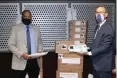  ??  ?? FRENCH ambassador to South Africa Aurélien Lechevalli­er, right, hands over a donation of medical equipment to Department of Health director-general Dr Sandile Buthelezi.