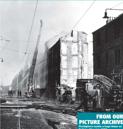  ??  ?? FROM OUR PICTURE ARCHIVE Firefighte­rs tackle a huge blaze on Ballater Street in 1955