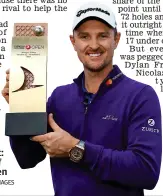  ?? GETTY IMAGES ?? Turkish delight: Rose shows off his Turkish Open prize