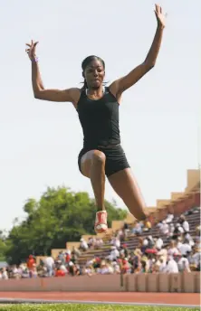  ?? Darryl Bush / The Chronicle 2007 ?? Jamesha Youngblood of Hercules won the long jump in 20 feet, 113 ⁄4 inches at the 2007 CIF Finals at Sacramento City College.