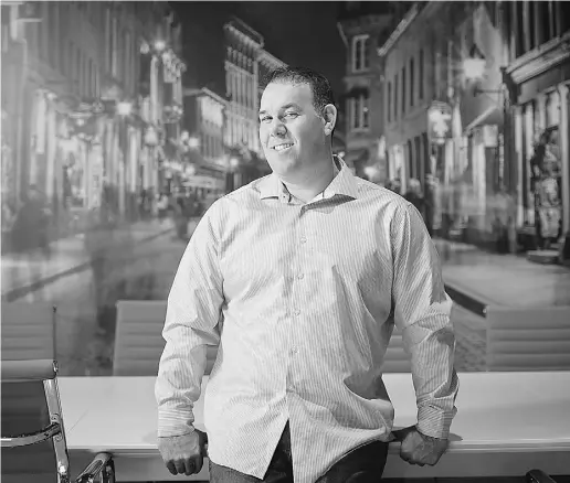  ?? Galit Rodan for National Post ?? Co-founder and CEO of VarageSale Carl Mercier, pictured in his Toronto offices in front of a mural that pays homage
to Montreal, the city where the company started, has no room for patriotism when it comes to financing.