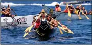  ?? AP/ELAINE THOMPSON ?? A canoe from the Puyallup Tribe is paddled Wednesday toward a landing during an annual journey in Seattle. Dozens of tribal canoes were arriving at Alki Beach in Seattle as part of an annual American Indian celebratio­n.